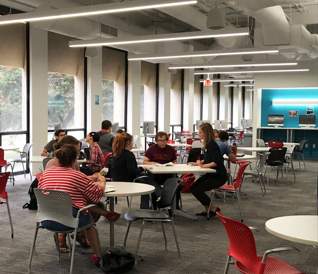 Students working with consultants in the Writing Center